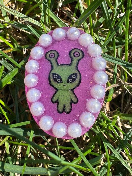 pearl accented alien brooch
