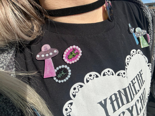 pearl accented spaceship brooch