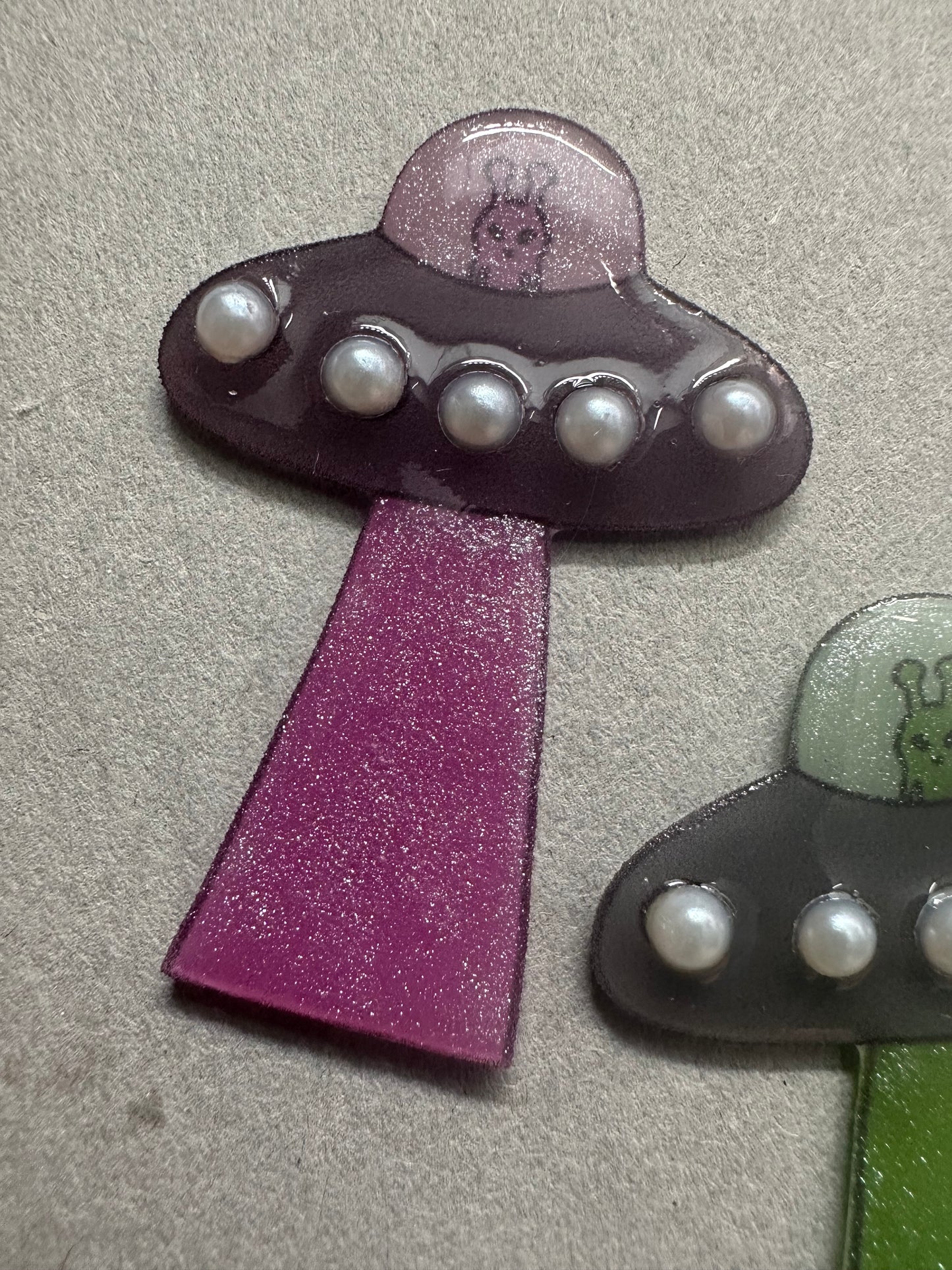 pearl accented spaceship brooch