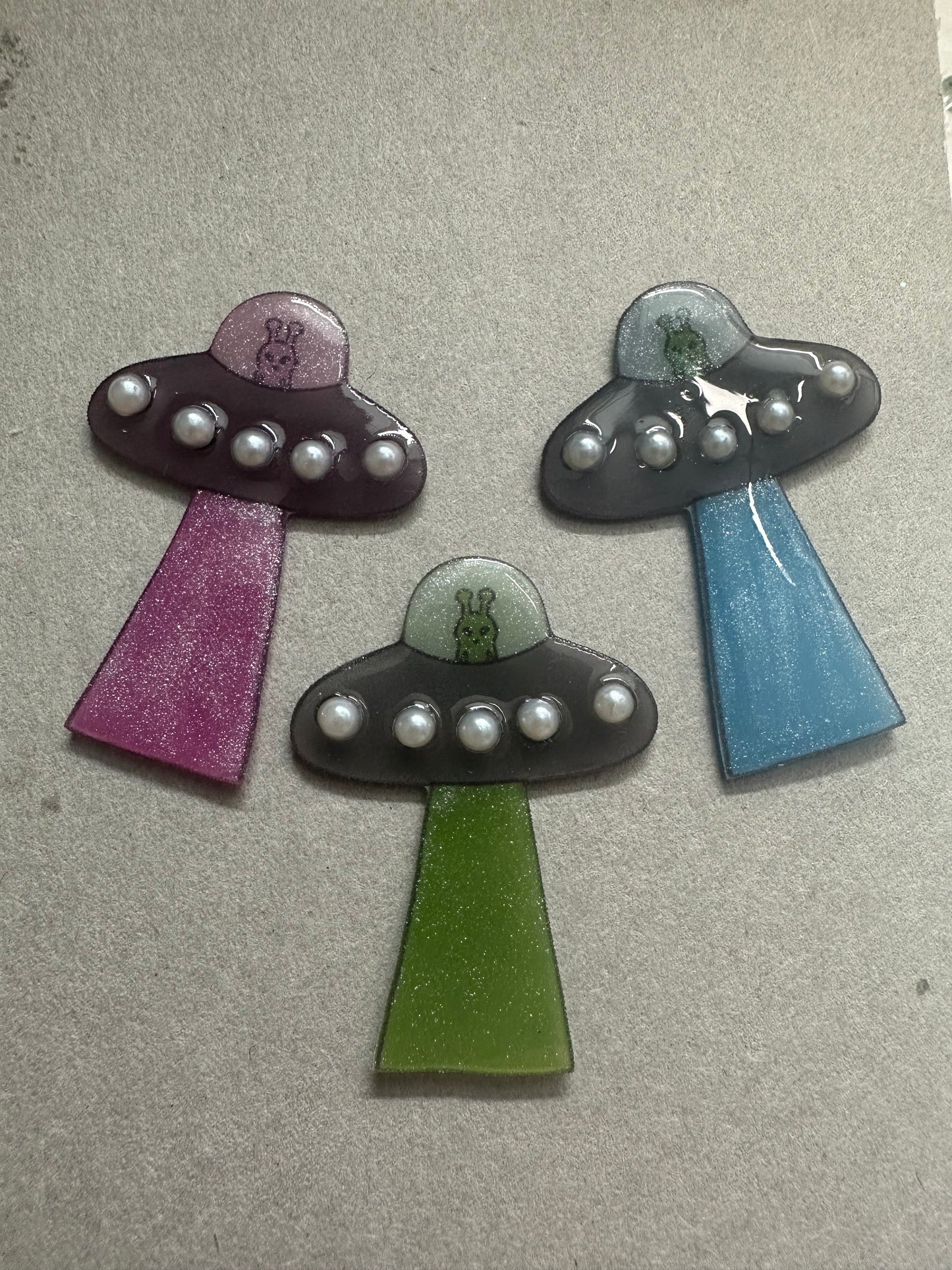 pearl accented spaceship brooch