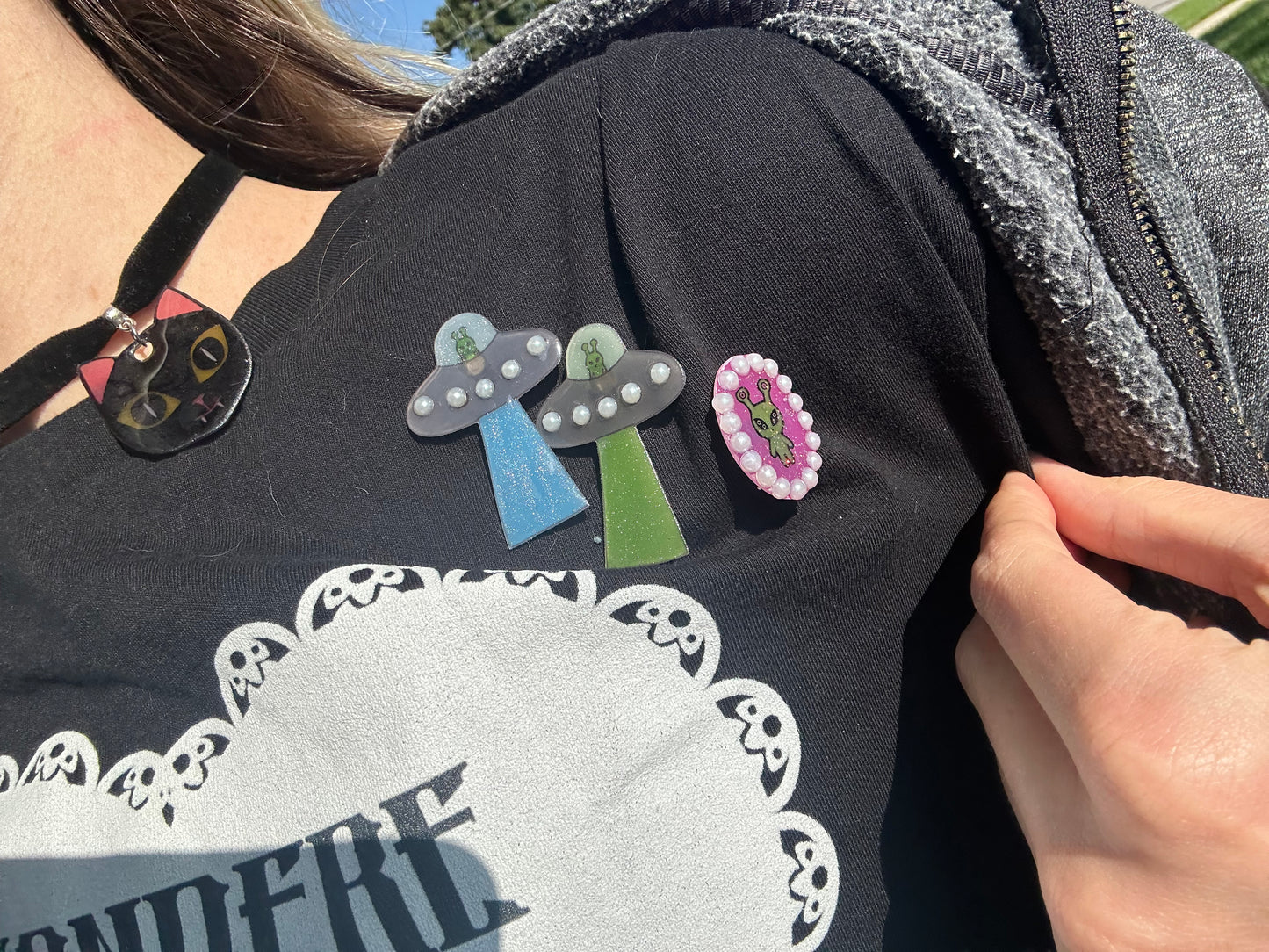 pearl accented spaceship brooch