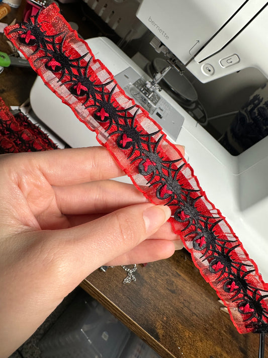 black widow ruffle collar