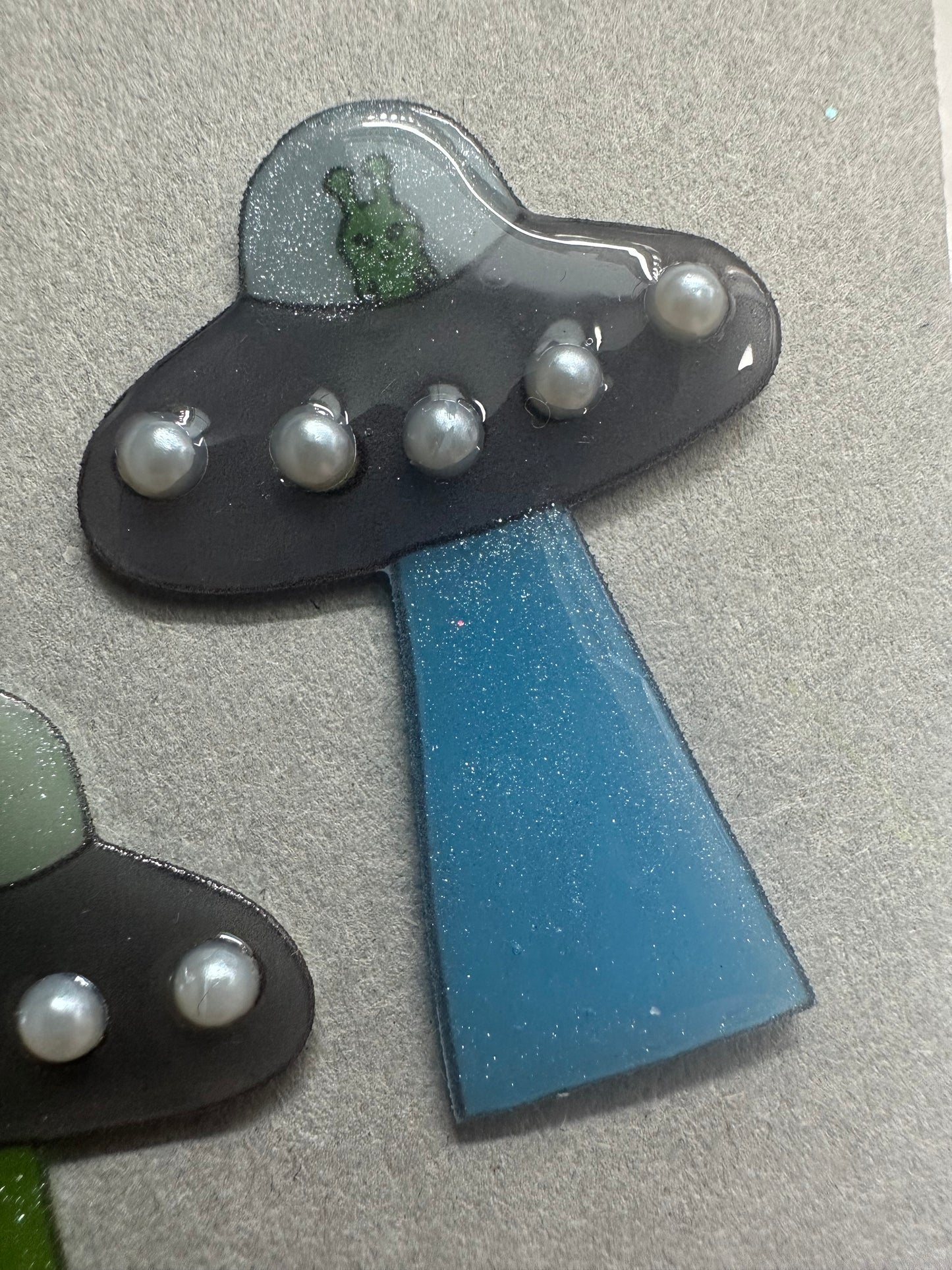 pearl accented spaceship brooch